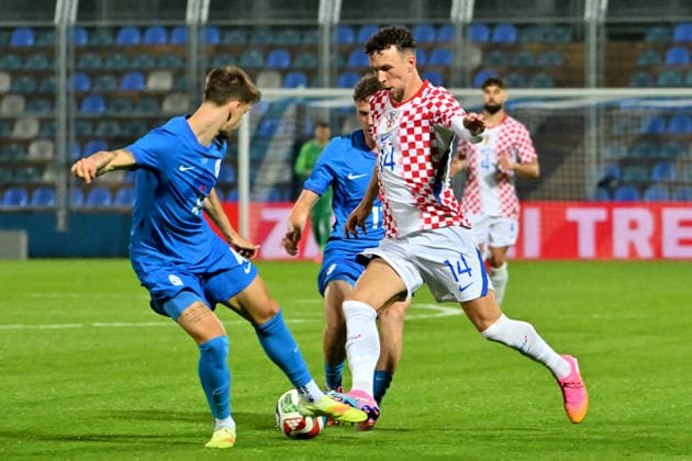 VARAZDIN, CROATIA - JUNE 07: Ivan Perisic of Croatia (R) in action against Marcel Ratnik of Slovenia (L) during the International men’s football Friendly match between Croatia and Slovenia at Stadium Varteks, Varazdin on June 07, 2026 in Varazdin, Croatia. (Photo by Igor Kupljenik Sports Press Photo).  Copyright: xIgorxKupljenikx xSPPx Sportspressphoto_SPR163070