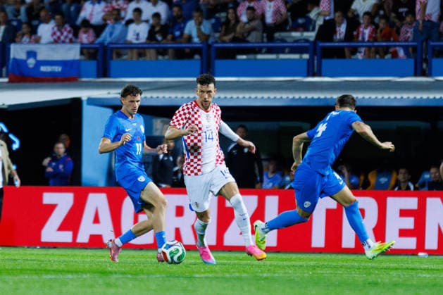 Pre World cup international friendly 2026 match between Croatia and Slovenia Ivan Perisic Croatia 14 and Tjas Begic Slovenia 11 seen in action during Pre World cup international friendly 2026 football match between Croatia and Slovenia, Stadium Varteks, Varazdin, Croatia 07 06 2026 Copyright: xBEAUTIFULxSPORTS Bosnjakovicx