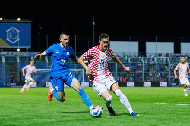 Pre World cup international friendly 2026 match between Croatia and Slovenia David Zec Slovenia 17 and Luka Sucic Croatia 21 competes for the ball with xxx during Pre World cup international friendly 2026 football match between Croatia and Slovenia, Stadium Varteks, Varazdin, Croatia 07 06 2026 Copyright: xBEAUTIFULxSPORTS Bosnjakovicx