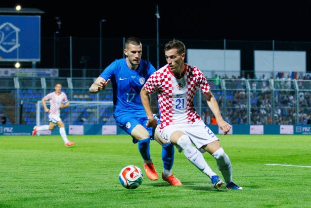 Pre World cup international friendly 2026 match between Croatia and Slovenia David Zec Slovenia 17 and Luka Sucic Croatia 21 competes for the ball with xxx during Pre World cup international friendly 2026 football match between Croatia and Slovenia, Stadium Varteks, Varazdin, Croatia 07 06 2026 Copyright: xBEAUTIFULxSPORTS Bosnjakovicx
