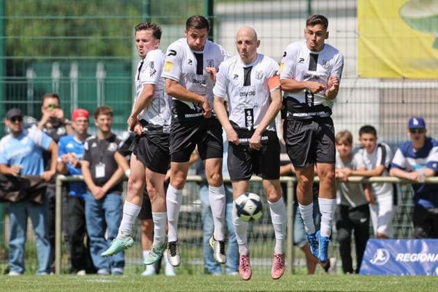 Football promotion match RL SW FC Eddersheim FK 03 Pirmasens 07 06 26, The Eddersheim wall is stable