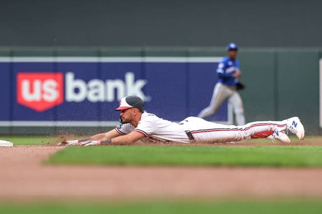 June 7, 2026, Minneapolis, Minnesota, USA: Minnesota Twins left fielder TREVOR LARNACH (9) slides safely into second base for a double in the ninth inning during a MLB, Baseball Herren, USA Baseball game between the Kansas City Royals and the Minnesota Twins at Target Field in Minneapolis, Minnesota on June 7th, 2026. The Royals defeated the Twins 6-5. ZUMA Press Wire. Minneapolis USA - ZUMAg254 20260607_zsp_g254_054 Copyright: xStevenxGarciax