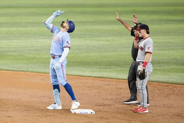 June 7, 2026, Arlington, Texas, USA: Texas Rangers right fielder BRANDON NIMMO (24) celebrates after hitting a double during a MLB, Baseball Herren, USA game between the Cleveland Guardians and Texas Rangers at Globe Life Field. Texas wins 10-0. MLB 2026: Rangers 10:0 Guardians  - ZUMAf180 20260607_zsp_f180_029 Copyright: xMarkxFannx