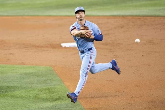 June 7, 2026, Arlington, Texas, USA: Texas Rangers second baseman JUSTIN FOSCUE (14) throws the runner out at first base during a MLB, Baseball Herren, USA game between the Cleveland Guardians and Texas Rangers at Globe Life Field. Texas wins 10-0. MLB 2026: Rangers 10:0 Guardians  - ZUMAf180 20260607_zsp_f180_030 Copyright: xMarkxFannx