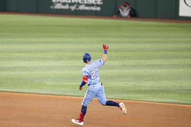 June 7, 2026, Arlington, Texas, USA: Texas Rangers center fielder MICHAEL HELMAN (23) celebrates after hitting a homerun during a MLB, Baseball Herren, USA game between the Cleveland Guardians and Texas Rangers at Globe Life Field. Texas wins 10-0. Arlington USA - ZUMAf180 20260607_zsp_f180_007 Copyright: xMarkxFannx