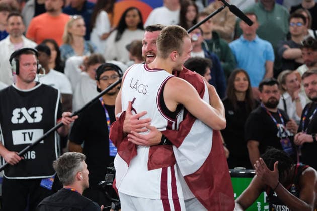 June 7, 2026, Warsaw, Masovian Voivodeship, Poland: Latvia s FRANCIS LACIS (6) and ZIGMARS RAIMO (9) hug in victory at the end of the FIBA 3x3 Basketball World Cup men s final game between Latvia and Germany in Warsaw, Poland. Latvia defeated Germany to become world champions. Basketball 2026: FIBA 3x3 World Cup Men s Final: Latvia 20:15 Germany  - ZUMAk204 20260607_zip_k204_060 Copyright: xRomanxKozielx