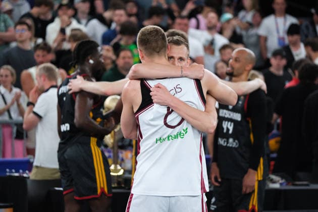 June 7, 2026, Warsaw, Masovian Voivodeship, Poland: Latvia s FRANCIS LACIS (6) and NAURIS MIEZIS (1) hug in victory at the end of the FIBA 3x3 Basketball World Cup men s final game between Latvia and Germany in Warsaw, Poland. Latvia defeated Germany to become world champions. Warsaw Poland - ZUMAk204 20260607_zip_k204_059 Copyright: xRomanxKozielx
