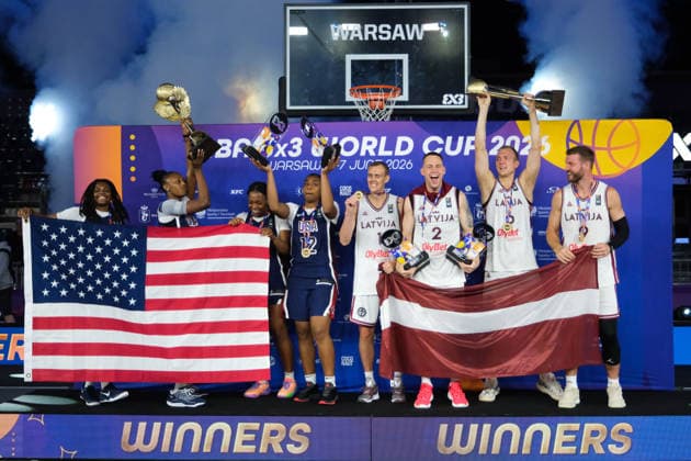 June 7, 2026, Warsaw, Masovian Voivodeship, Poland: USA s MILAYSIA FULWILEY (4), MIKAYLAH WILLIAMS (12), SAHARA WILLIAMS (6), and JOYCE EDWARDS (13) celebrate with their women s 1st place medals and the world champions trophy; Latvia s FRANCIS LACIS (6), NAURIS MIEZIS (1), KARLIS LASMANIS (2), and ZIGMARS RAIMO (9) celebrate with their men s 1st place medals and men s world champions trophy during the prize ceremony at the conclusion of the 2026 FIBA 3x3 Basketball World Cup in Warsaw, Poland. Warsaw Poland - ZUMAk204 20260607_zip_k204_105 Copyright: xRomanxKozielx