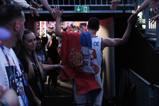 June 7, 2026, Warsaw, Masovian Voivodeship, Poland: Serbia s STRAHINJA STOJACIC (3) wears a Serbian flag and leaves the arena at the end of the FIBA 3x3 Basketball World Cup men s 3rd place game between Serbia and France in Warsaw, Poland. Serbia defeated France to win 3rd place in the tournament. Basketball 2026: FIBA 3x3 World Cup Men s 3rd Place: Serbia 20:19 France  - ZUMAk204 20260607_zip_k204_133 Copyright: xRomanxKozielx