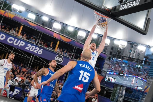 June 7, 2026, Warsaw, Masovian Voivodeship, Poland: Serbia s NENAD NERANDZIC (5) slam dunks while France s EMMANUEL MONCEAU (9) and ALEX VIALARET (15) watch on during the FIBA 3x3 Basketball World Cup men s 3rd place game between Serbia and France in Warsaw, Poland. Warsaw Poland - ZUMAk204 20260607_zip_k204_134 Copyright: xRomanxKozielx
