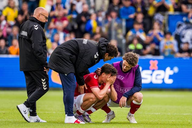 Denmark v Ukraine, football friendly, Odense, Denmark Odense, Denmark. 07th, June 2026. Joakim Maehle of Denmark seen in shock after the collapse of Christian Eriksen and is supported by Andreas Christensen (L) and Jens Stage (R) at the football friendly between Denmark and Ukraine at Odense Stadion in Odense. Denmark, Odense, Nature Energy Park  Copyright: xGonzalesxPhoto KentxRasmussenx