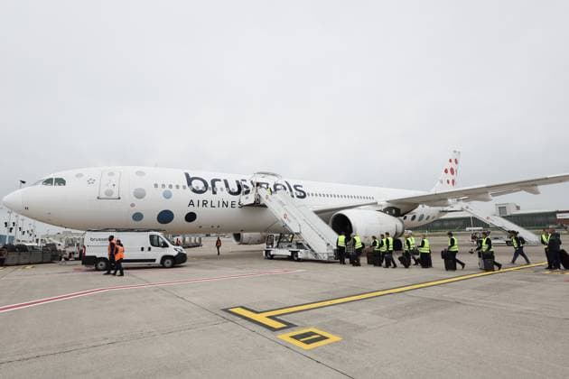 The Brussels Airlines cabin crew arrives at the plane ahead of the departure of Belgian national soccer team the Red Devils from Brussels Airport, Monday 08 June 2026, in Zaventem. The Red Devils fly to their base camp in Seattle for the FIFA World Cup, WM, Weltmeisterschaft, Fussball 2026 which is held in the United States, Canada and Mexico. BRUNOxFAHY  x176590979x