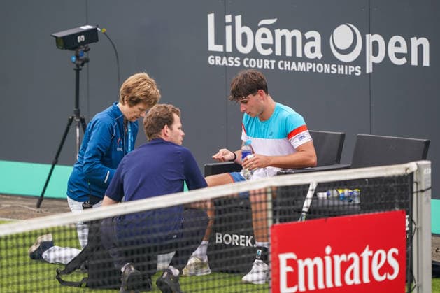 2026-06-08 - Libema Open 2026 ROSMALEN, NETHERLANDS - JUNE 8: Mees Rottgering of The Netherlands with fysiotherapists on the court during the Libema Open 2026 at the Autotron on June 8, 2026 in Rosmalen, Netherlands Rosmalen Autotron Netherlands Content not available for redistribution in The Netherlands directly or indirectly through any third parties. Copyright: xAndrexWeeningx