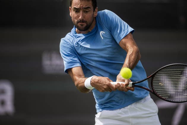 S-HERTOGENBOSCH, NETHERLANDS - JUNE 08: Marin Cilic of Croatia returns with a backhand shot to opponent Denis Shapovalov of Canada during their ATP, Tennis Herren Singles First Round match at the LibÃ ma Open on June 8, 2026 at Autotron s-Hertogenbosch in s-Hertogenbosch, Netherlands. Credit: Andy Astfalck NurPhoto Netherlands Copyright: xAndyxAstfalckx