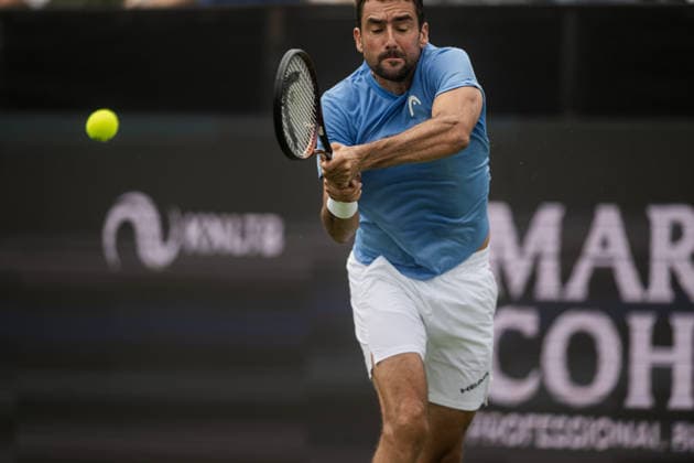 S-HERTOGENBOSCH, NETHERLANDS - JUNE 08: Marin Cilic of Croatia returns a backhand shot against Denis Shapovalov of Canada during their ATP, Tennis Herren Singles First Round match at the LibÃ ma Open on June 8, 2026 at Autotron s-Hertogenbosch in s-Hertogenbosch, Netherlands. Credit: Andy Astfalck NurPhoto Netherlands Copyright: xAndyxAstfalckx
