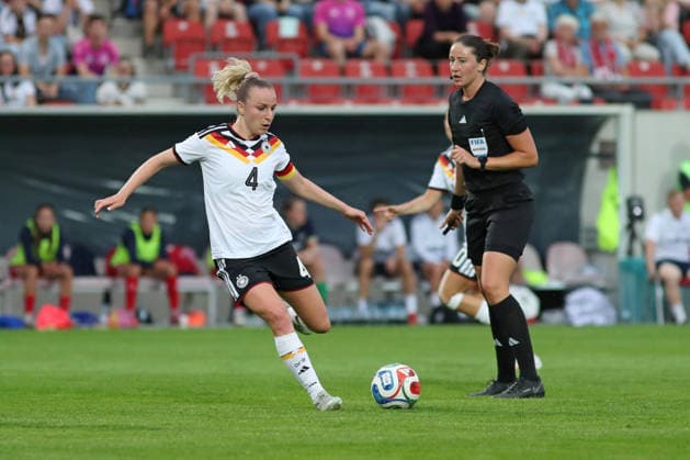 Soccer, U23 Women Germany Denmark, 08 06 26 Captain Vanessa Diehm 4, Germany U23, TSG Hoffenheim on the ball, behind her referee Franziska Wildfeuer Soccer, Test match U23 Women Germany Denmark on 08 06 26 at Leuna Chemie Stadium Halle Saale Copyright: xBEAUTIFULxSPORTS JanxKaeferx