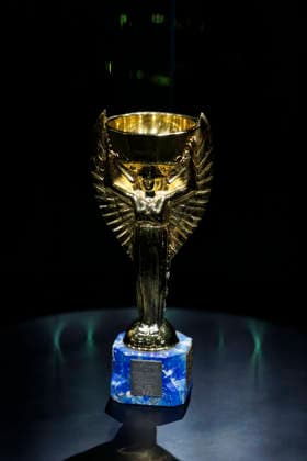 A photograph showing the Jules Rimet Trophy during the opening of the ‘Legacies of Champions’ exhibition at Rockefeller Center in New York, in New York, United States, 08 June 2026. The exhibition traces every World Cup since Uruguay 1930 through original artifacts, such as historic uniforms and balls, photographs, sticker albums, and memorabilia from the tournament s most iconic teams and players. FIFA and Hyundai bring the history of the World Cup to Rockefeller Center in New York !ACHTUNG: NUR REDAKTIONELLE NUTZUNG!  Copyright: xAlfonsoxLozanox AME9876 20260609-55020539356_1
