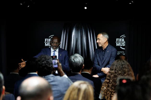 Former players George Weah (L) and Youri Djorkaeff chat during the opening of the Legacies of Champions exhibition at Rockefeller Center in New York, in New York, United States, 08 June 2026. The exhibition traces every World Cup since Uruguay 1930 through original artifacts, such as historic uniforms and balls, photographs, sticker albums, and memorabilia from the tournament s most iconic teams and players. FIFA and Hyundai bring the history of the World Cup to Rockefeller Center in New York !ACHTUNG: NUR REDAKTIONELLE NUTZUNG!  Copyright: xAlfonsoxLozanox AME9878 20260609-55020539359_1