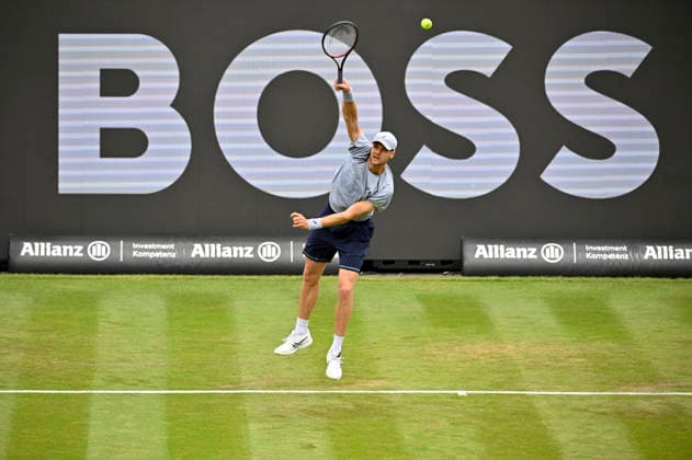 Yannick Hanfmann GER Action serve in the background perimeter advertising Logo BOSS Tennis Men BOSS Open ATP 250 Stuttgart 2026 Weissenhof BOSS Open ATP 250 Stuttgart 2026