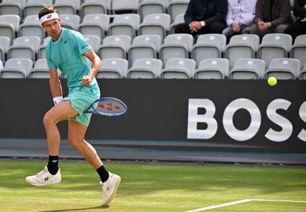 Daniel Altmaier GER Action shoots ball through own legs Leg shot Tennis Men BOSS Open ATP 250 Stuttgart 2026 Weissenhof BOSS Open ATP 250 Stuttgart 2026