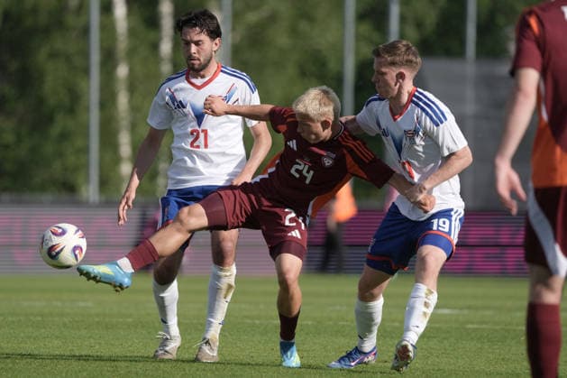 Latvia Faroe Islands Soccer, RÄ«ga, Latvia, 09.06.2026 Kristaps Grabovskis, centre, Geza David Turi and Jann Benjaminsen, left, in action during Baltic Cup game between Latvia and Faroe Islands national teams In Riga, Latvia, 09.06.2026. Photo: Roman Koksarov (RKF) RÄ«ga Latvia Copyright: xRomanxKoksarovx DSC00558.JPG
