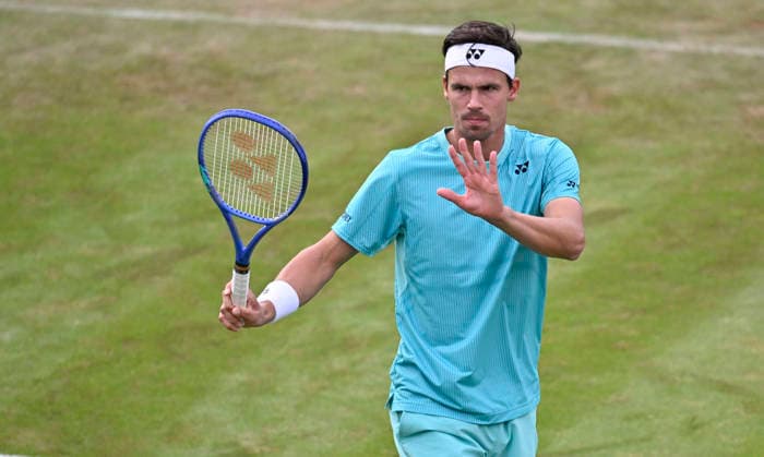 Daniel Altmaier GER gestures apologizes for net roll Tennis Men BOSS Open ATP 250 Stuttgart 2026 Weissenhof BOSS Open ATP 250 Stuttgart 2026