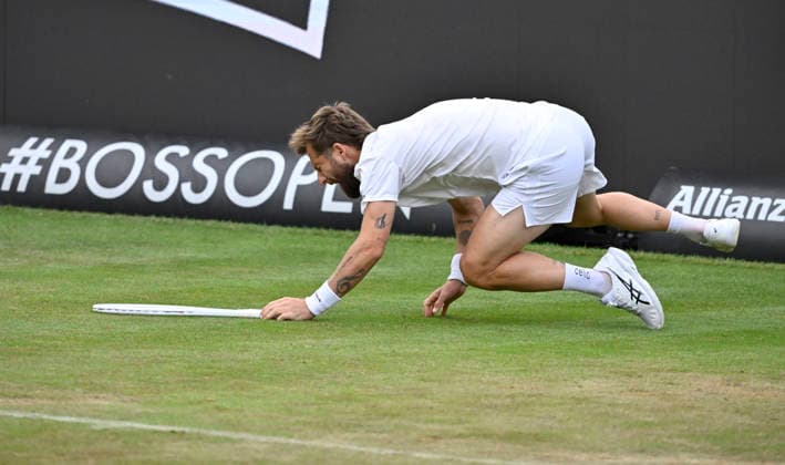 Corentin Moutet FRA action falls slips falls on the ground injured injury Tennis Men BOSS Open ATP 250 Stuttgart 2026 Weissenhof BOSS Open ATP 250 Stuttgart 2026