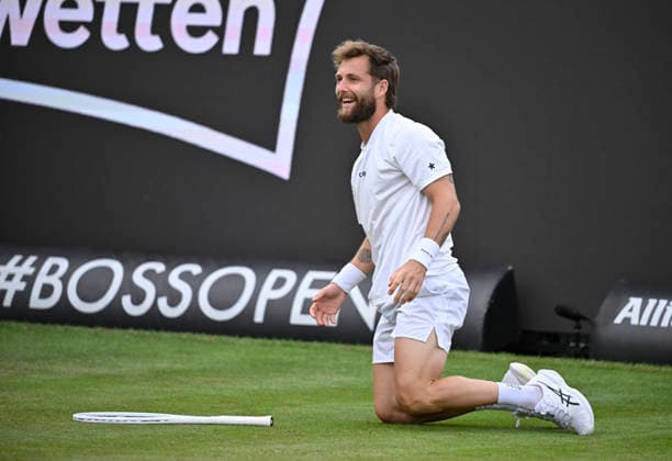 Corentin Moutet FRA action falls slips falls to the ground Tennis Men BOSS Open ATP 250 Stuttgart 2026 Weissenhof BOSS Open ATP 250 Stuttgart 2026