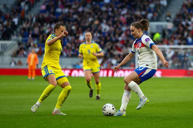 RECORD DATE NOT STATED 9th June 2026; Hill Dickinson Stadium, Liverpool, Merseyside, England; Womens World Cup Qualifier Football, England versus Ukraine; Niamh Charles of England Women tracked by Alina Savka of Ukraine Women RogerxEvans