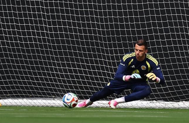 Angus Gunn of Scotland Scotland Training Session and press conference, PK, Pressekonferenz 2026 FIFA World Cup, WM, Weltmeisterschaft, Fussball Football, Atrium Health Performance Park, Charlotte, USA - 10 Jun 2026Charlotte Atrium Health Performance Park United States of America EDITORIAL USE ONLY No use with unauthorised audio, video, data, fixture lists, club league logos or live services. Online in-match use limited to 120 images, no video emulation. No use in betting, games or single club league player publications.  Copyright: xMichaelxZemanek Shutterstockx 16919987m