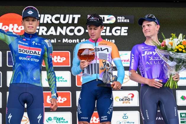 French Paul Magnier of Soudal Quick-Step, New Zealander Corbin Strong of NSN Cycling Team and Danish Anders Foldager of Team Jayco-AIUIa pictured on the podium after the Circuit Franco-Belge cycling race, 195,6 km from Tournai to Mont-de-l Enclus, stage 6 (out of 9) of the Lotto Cycling Cup, on Wednesday 10 June 2026. DAVIDxPINTENS  x177033407x