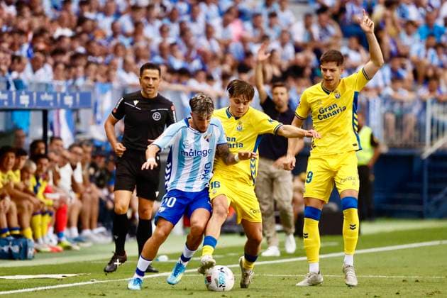 ESP LaLiga Hypermotion playoff Malaga v UD Las Palmas Lorenzo Amatucci of Las Palmas and David Larrubia of Malaga during LaLiga Hypermotion playoff semifinal between Malaga v UD Las Palmas played at La Rosaleda Stadium in Las Malaga, on June 10, 2026 in Spain Spain Futbol Copyright: xAgenciaxLOFx