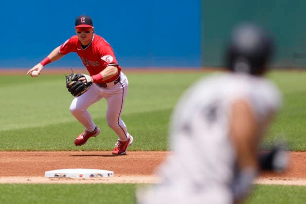 Cleveland Guardians Travis Bazzana (37) looks to throw to first base after fielding a ball from New York Yankee s Amed Rosario (14) in the first inning at Progressive Field in Cleveland, Ohio on Wednesday, June 10, 2026.  CLE20260610103 AARONxJOSEFCZYK