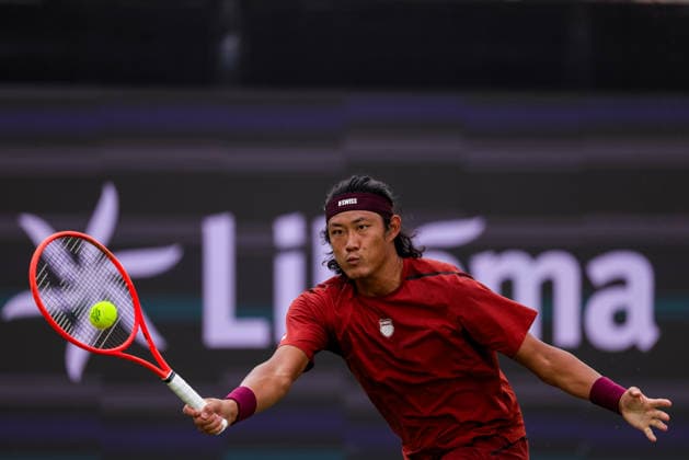 ROSMALEN, NETHERLANDS - JUNE 11: Zhizhen Zhang of China plays a forehand in his Men s Singles Second Round match against Tallon Griekspoor of the Netherlands during Day 4 of the Libema Open Grass Court Championships at the Autotron on June 11, 2026 in Rosmalen, Netherlands.  Copyright: xRenexNijhuis MBxMediax