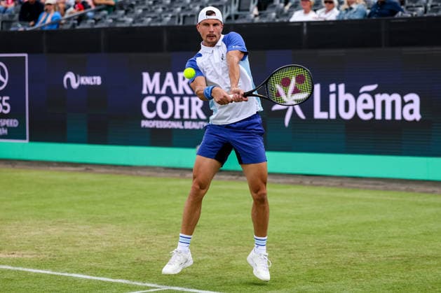 ROSMALEN, NETHERLANDS - JUNE 11: Marton Fucsovics of Hungary plays a backhand in his Men s Singles Second Round match against Felix Auger-Aliassime of Canada during Day 4 of the Libema Open Grass Court Championships at the Autotron on June 11, 2026 in Rosmalen, Netherlands.  Copyright: xRenexNijhuis MBxMediax