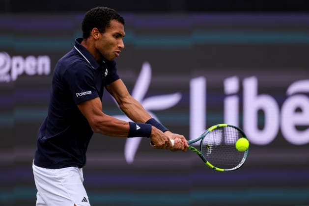 ROSMALEN, NETHERLANDS - JUNE 11: Felix Auger-Aliassime of Canada plays a backhand in his Men s Singles Second Round match against Marton Fucsovics of Hungary during Day 4 of the Libema Open Grass Court Championships at the Autotron on June 11, 2026 in Rosmalen, Netherlands.  Copyright: xRenexNijhuis MBxMediax