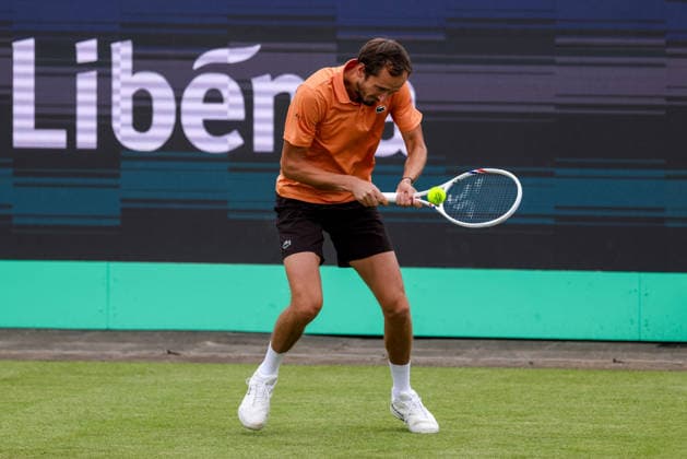 ROSMALEN, NETHERLANDS - JUNE 11: Daniil Medvedev plays a backhand in his Men s Singles Second Round match against Thijs Boogaard of the Netherlands during Day 4 of the Libema Open Grass Court Championships at the Autotron on June 11, 2026 in Rosmalen, Netherlands.  Copyright: xRenexNijhuis MBxMediax