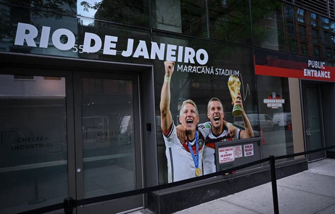 Football FIFA World Cup 2026 11 06 2026 Exterior view of the German House of Soccer in Manhattan New York, Pre Opening at the opening match of the World Cup 2026, Mexico South Africa, fourth German World Cup victory 2014 in Rio Brazil, Bastian Schweinsteiger and Lukas Podolski with trophy
