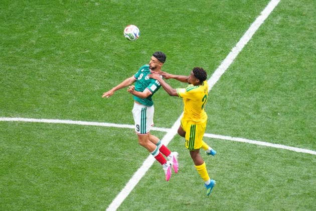 Mexico v South Africa - FIFA World Cup, WM, Weltmeisterschaft, Fussball 2026 - Group A MEXICO CITY, MEXICO - JUNE 11: Raul Jimenez (9) of Mexico and Ime Okon (R) of South Africa compete for the ball during the World Cup First Stage Group A match between Mexico and South Africa at Estadio Azteca (Mexico Stadium) in Mexico City, Mexico on June 11, 2026. Jose Hernandez Anadolu Mexico City Mexico. Editorial use only. Please get in touch for any other usage.  Copyright: x2026xAnadoluxJosexHernandezx
