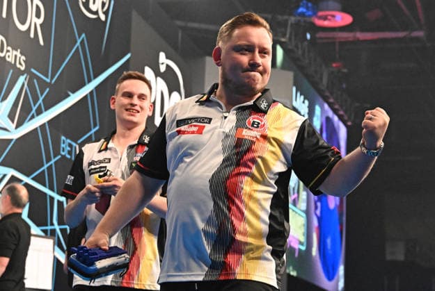 11 06 2026, xhbx, Dart World Cup of Darts 2025, v l Ricardo Pietreczko Germany , Martin Schindler Germany cheers after the end of the match DFL DFB REGULATIONS PROHIBIT ANY USE OF PHOTOGRAPHS as IMAGE SEQUENCES and or QUASI VIDEO Frankfurt
