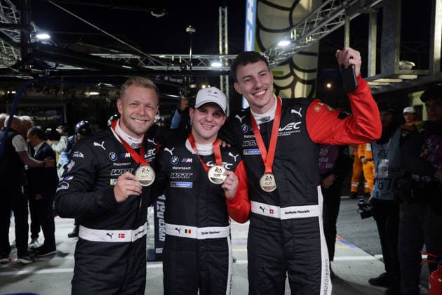 Kevin Magnussen DE , fastest Dries Vanthoor BEL and Raffaele Marciello SUI BMW M Hybrid V8 15 with the medals for the Hyperpole in the pits, 24 Hours of Le Mans Race, France, WEC World Endurance Championship, 11 06 2026, Qualifiyng, Pole Position