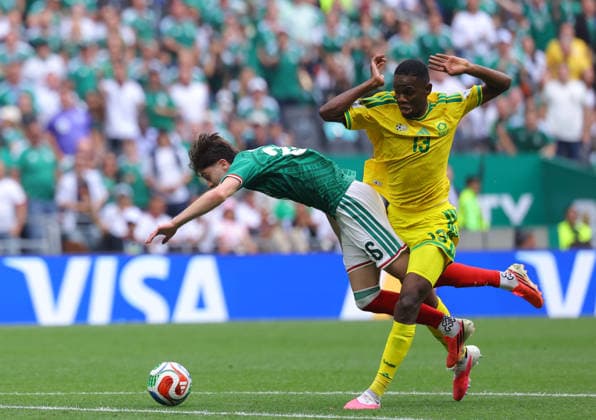 MEXICO CITY, MEXICO - JUNE 11: Brian GutiÃ rrez of Mexico is fouled by Yaya Sithole of South Africa during the FIFA World Cup, WM, Weltmeisterschaft, Fussball 2026 Group A match between Mexico and South Africa at Mexico City Stadium on June 11, 2026 in Mexico City, Mexico.  Copyright: xMBxMediax