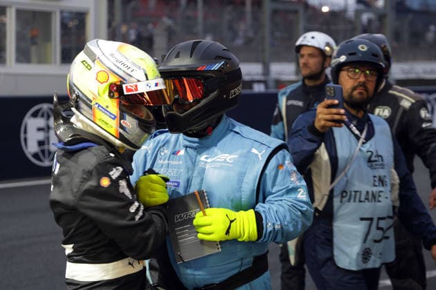 A mechanic congratulates the fastest Dries Vanthoor BEL BMW M Hybrid V8 15 after the Hyperpole in front of the pits, 24 Hours of Le Mans Race, France, WEC World Endurance Championship, 11 06 2026, Qualifiyng