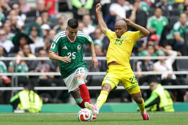 MEXICO, MEXICO CITY - JUNE 11, 2026: Mexico s Roberto Alvarado (L) and South Africa s Jayden Adams fight for the ball in the 2026 FIFA World Cup, WM, Weltmeisterschaft, Fussball Group A football match between Mexico and South Africa at Mexico City Stadium. Mikhail Sinitsyn TASS  93686101