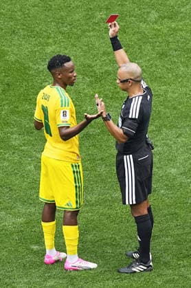 Football: 2026 World Cup A referee shows a red card to South Africa s Themba Zwane during the first half of the World Cup opener against Mexico at Mexico City Stadium in the Mexican capital on June 11, 2026.  A14AA0005618489P