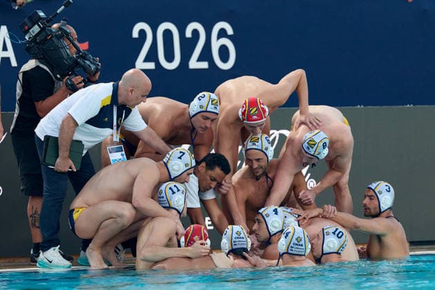 Zodiac CNAB players and staff members huddle around head coach Fran Fernandez (bottom, centre) during the European Aquatics Men™s Water polo, Wasserball Champions League semi-final (SF1) match between Zodiac CNAB and FTC Telekom Waterpolo at the National Pool, Tal-Qroqq, Malta, on 11 June 2026. Zodiac CNAB v FTC Telekom Waterpolo - Men™s Water Polo Men Champions League 2026 EA_CL_2026_MLT