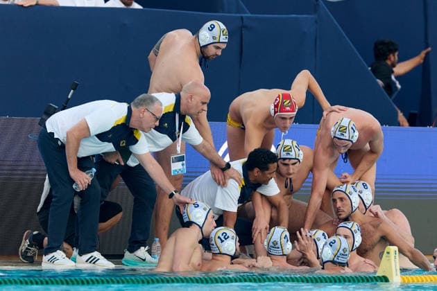 Zodiac CNAB players and staff members huddle around head coach Fran Fernandez (bottom, centre) during the European Aquatics Men™s Water polo, Wasserball Champions League semi-final (SF1) match between Zodiac CNAB and FTC Telekom Waterpolo at the National Pool, Tal-Qroqq, Malta, on 11 June 2026. Zodiac CNAB v FTC Telekom Waterpolo - Men™s Water Polo Men Champions League 2026 EA_CL_2026_MLT