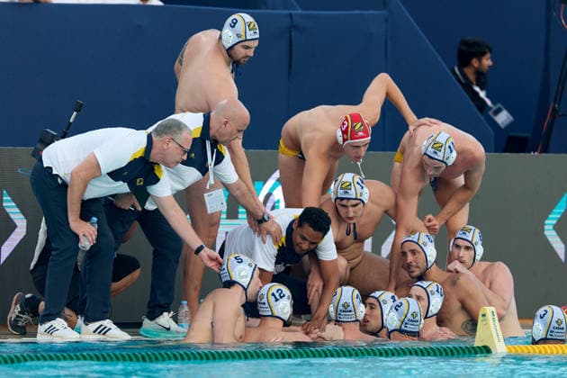 Zodiac CNAB players and staff members huddle around head coach Fran Fernandez (bottom, centre) during the European Aquatics Men™s Water polo, Wasserball Champions League semi-final (SF1) match between Zodiac CNAB and FTC Telekom Waterpolo at the National Pool, Tal-Qroqq, Malta, on 11 June 2026. Zodiac CNAB v FTC Telekom Waterpolo - Men™s Water Polo Men Champions League 2026 EA_CL_2026_MLT
