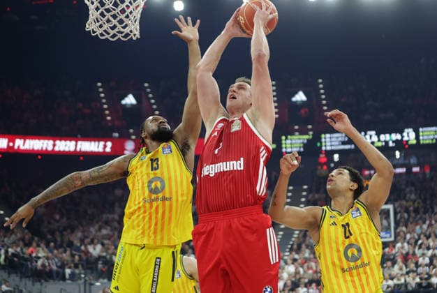 Bayerns 7 Johannes VOIGTMANN between Berlins 13 ROBERTS and Berlins 21 RATAJ Basketball Bayern Berlin Playoff Final, 1 game, 2025 2026 season, on 12 6 2026 in Munich Source Copyright Credit Oryk HAIST xBASKETBALL-BAYERN-BERLINx
