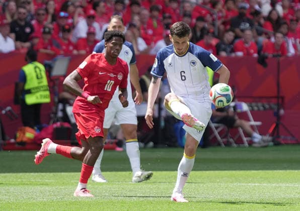CAN, World Cup FIFA 2026, preliminary round, Canada vs Bosnia and Herzegovina 12 06 2026, Toronto Stadium, Toronto, CAN, World Cup FIFA 2026, preliminary round, Canada vs Bosnia and Herzegovina, pictured Jonathan David Canada , Benjamin Tahirovic Bosnia nordphotoxGmbHx xBratic nph00250